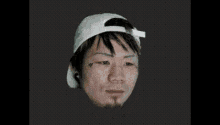 a man wearing a white hat with a tattoo on his face