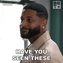 a man with a beard is asking if he has seen these