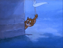 a cartoon mouse is hanging from a rope in the water .