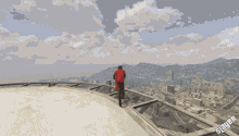 a man in a red coat stands on top of a building overlooking a city in a video game