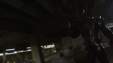 a blurry picture of a person in a red and black costume