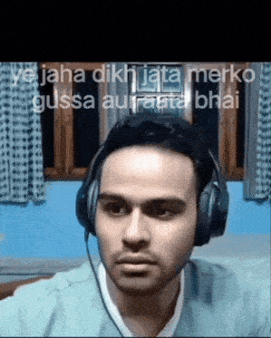 a man wearing headphones with the words 
