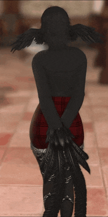 a woman in a plaid skirt is standing with her back to the camera