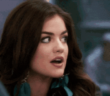 a woman with a surprised look on her face