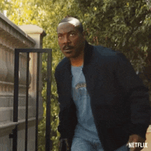 Walking Cautiously Axel Foley GIF - Walking Cautiously Axel Foley Beverly Hills Cop GIFs