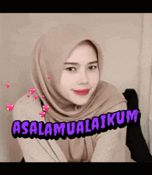 a woman wearing a hijab with the words assalamualaikum on the bottom