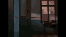 a hallway with a window and a table in the middle of it .