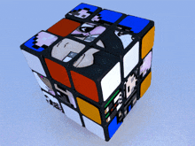 a colorful rubik 's cube with a picture of a man on it