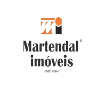 a logo for martendal imoveis shows a w and a circle