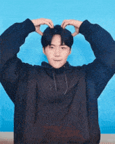 Seonho Finger Hearts GIF - Seonho Finger Hearts Cheek Heart GIFs