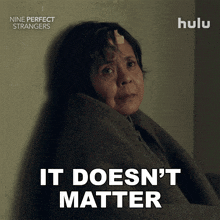 a poster for nine perfect strangers shows a woman wrapped in a blanket and says it does n't matter