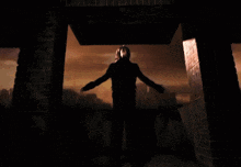 a silhouette of a man with his arms outstretched in front of a city skyline