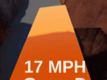 a sign that says 17 mph on it in white letters