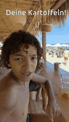 a shirtless boy sitting at a bar with the words " deine kartoffeln " on the bottom