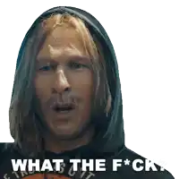 a man with long hair and a mustache is wearing a hoodie and says what the f * ck