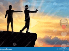two men are standing on top of a cliff and one is pointing at the other