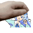 a hand is holding a picture of a girl with blue hair and blue eyes .