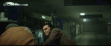 two men are fighting in a room with the hashtag @ichicasandom