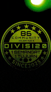 a logo for the 86 community kojom yuk division 20 since 2025