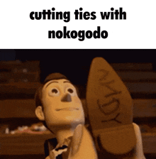 woody from toy story is holding a shoe with the word andy on it