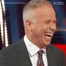Laughing Gerry Dee GIF - Laughing Gerry Dee Family Feud Canada GIFs