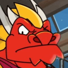 a close up of a cartoon dragon 's face with an angry look on his face