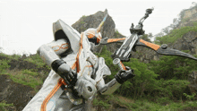 a robot with a sword and a bow and arrow