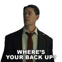 a man in a suit and tie is saying where 's your back up