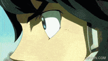 a close up of a person 's eye with the website gifrun.com visible