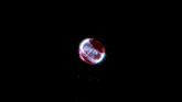 a close up of a futuristic device with a red center