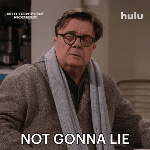a man wearing glasses and a scarf says not gonna lie