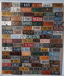 a collection of arizona license plates are displayed