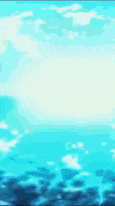 a pixel art of the ocean with a blue sky and white clouds