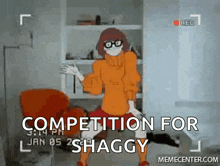 a video of scooby doo dancing with the words competition for shaggy in the corner .
