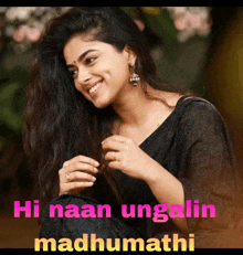 a picture of a woman with the words hi naan ungalin madhumathi