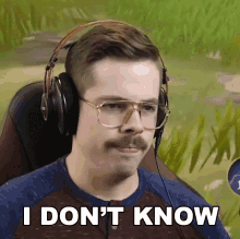a man wearing headphones and glasses says i don 't know