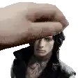 a hand is holding a man 's head in a pixel art .