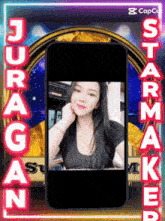 a phone with a picture of a woman and the words juragan starmaker on it