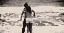 A Little Bit Naked GIF - Hookup Couple Beach GIFs