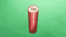 a stack of poker chips with the number 100 on the top