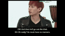 a man in a leather jacket is talking to another man