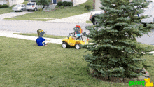 a yellow toy jeep is parked in front of a tree