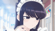 a girl with long black hair and a maid 's headband is holding a piece of paper .