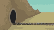 a pink train is going through a tunnel on the tracks .