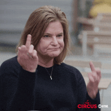 a woman is giving the middle finger in a showtime ad