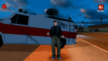 a man is standing in front of a van that says san news
