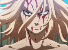 a close up of a man with blood on his face