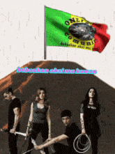 a group of people in front of a flag that says one community