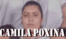 a blurred image of a woman with the name camila poxina