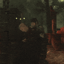 two men are standing next to each other in a video game with a brick wall in the background
